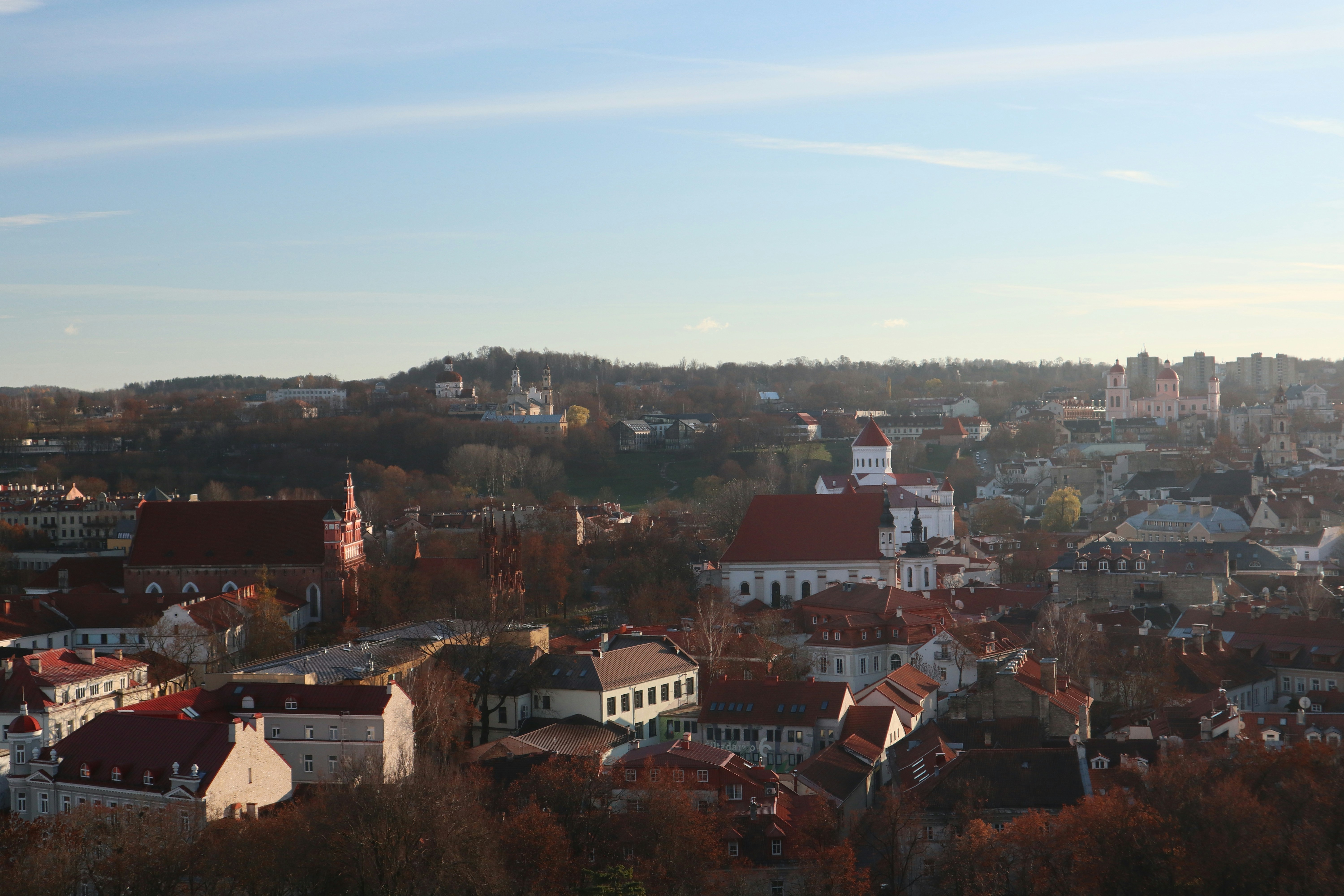 a view of a city from a hill