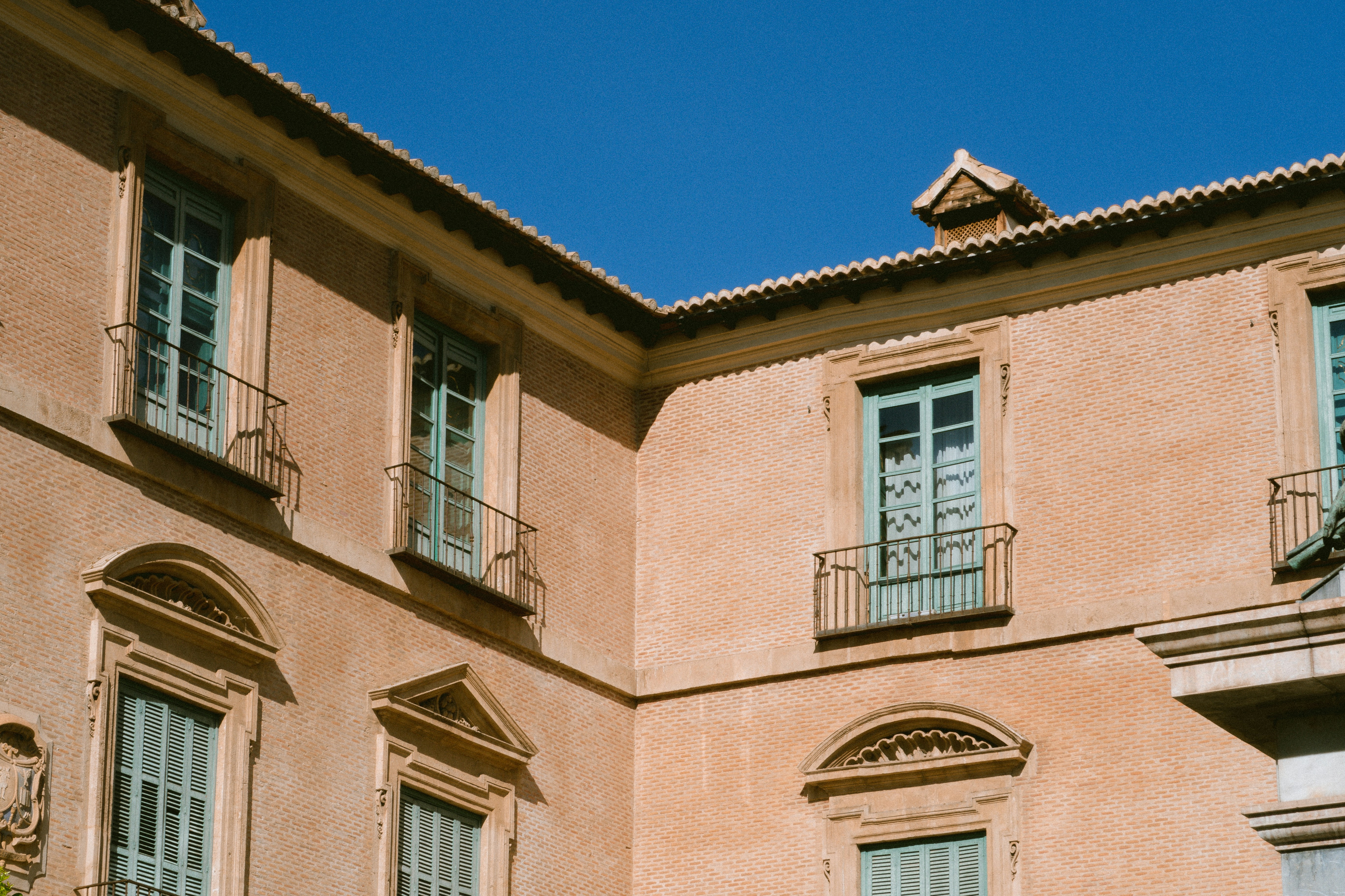 a building with a clock on the front of it