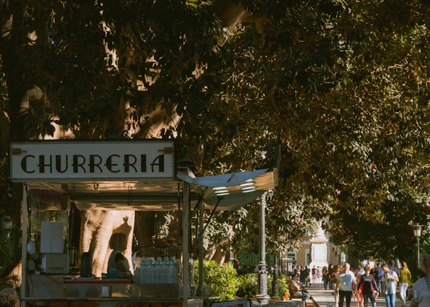 Happy family sharing churros outdoors, capturing the friendly and quick service vibe.