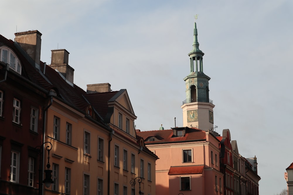 a tall building with a clock on the top of it