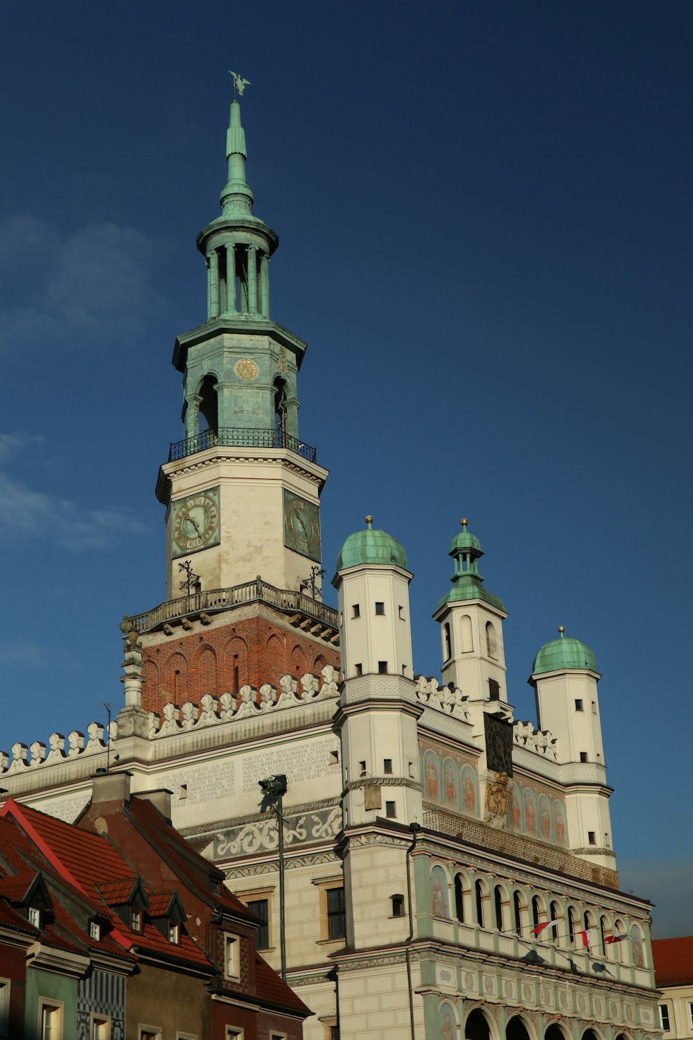 a tall building with a clock on the top of it