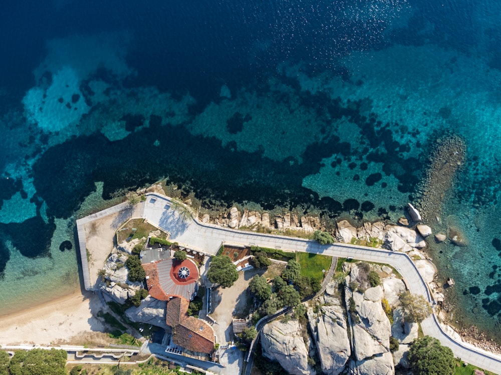 an aerial view of a beach and a resort