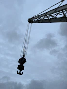 Heavy-duty lifting equipment in operation at an industrial site.