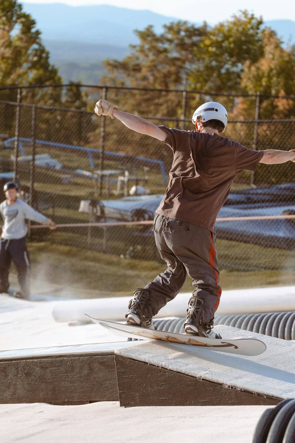 a man riding a skateboard on top of a ramp