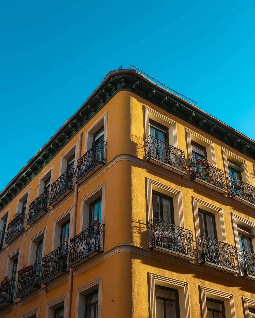 a tall building with balconies and balconies on the balconies