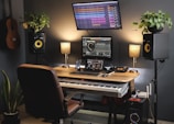a desk with a keyboard and a monitor