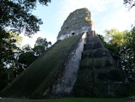 a very tall pyramid with stairs leading up to it