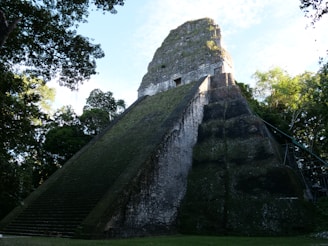 a very tall pyramid with stairs leading up to it