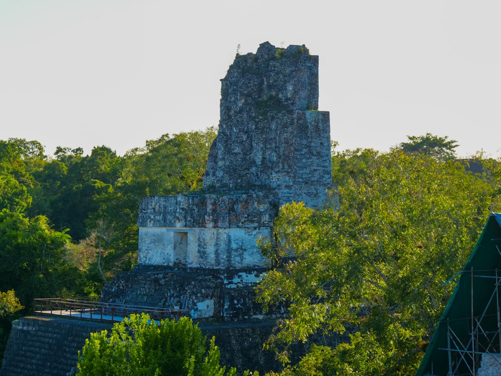 a tall tower with a clock on top of it