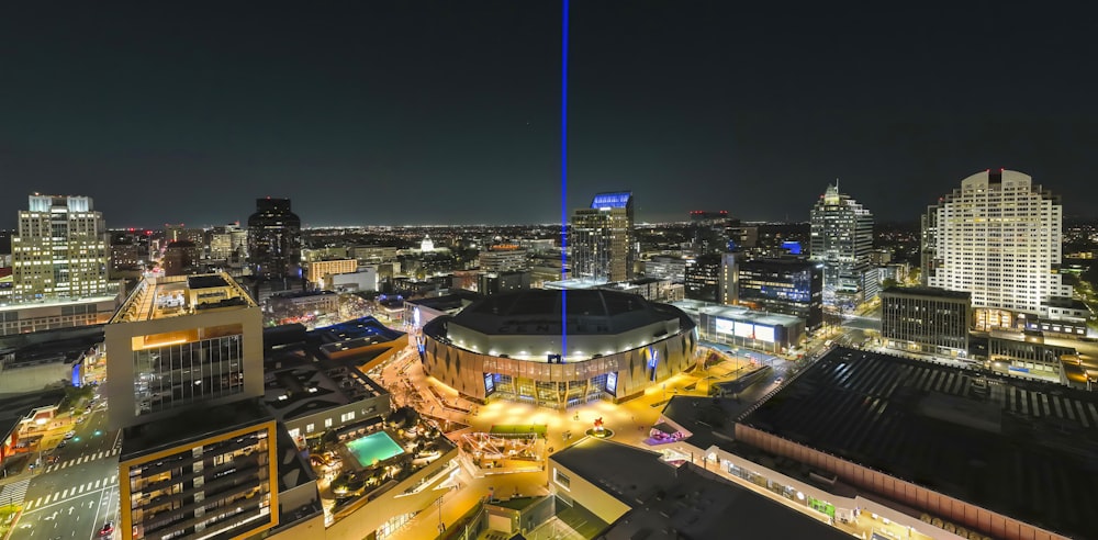 a view of a city at night from the top of a building