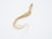A single ginseng root with a long, slender body and numerous thin, fibrous roots extending from one end. The root is a pale beige color and lies on a plain, light background.