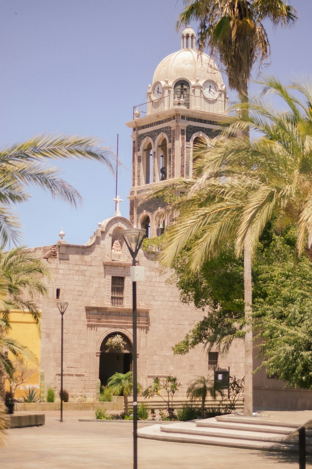 a large building with a clock on the top of it