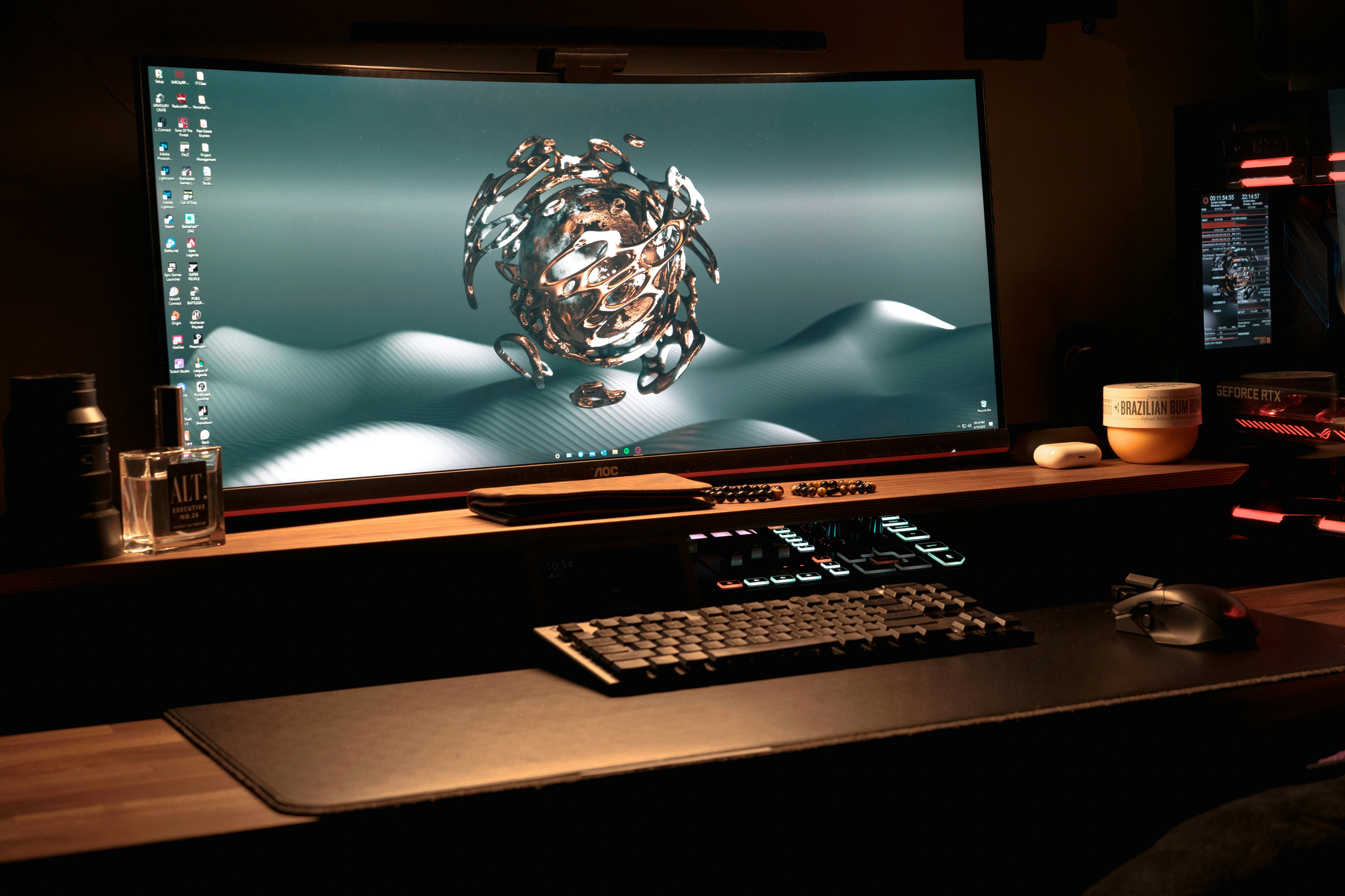 3D model wireframe on computer screen - a computer monitor sitting on top of a desk