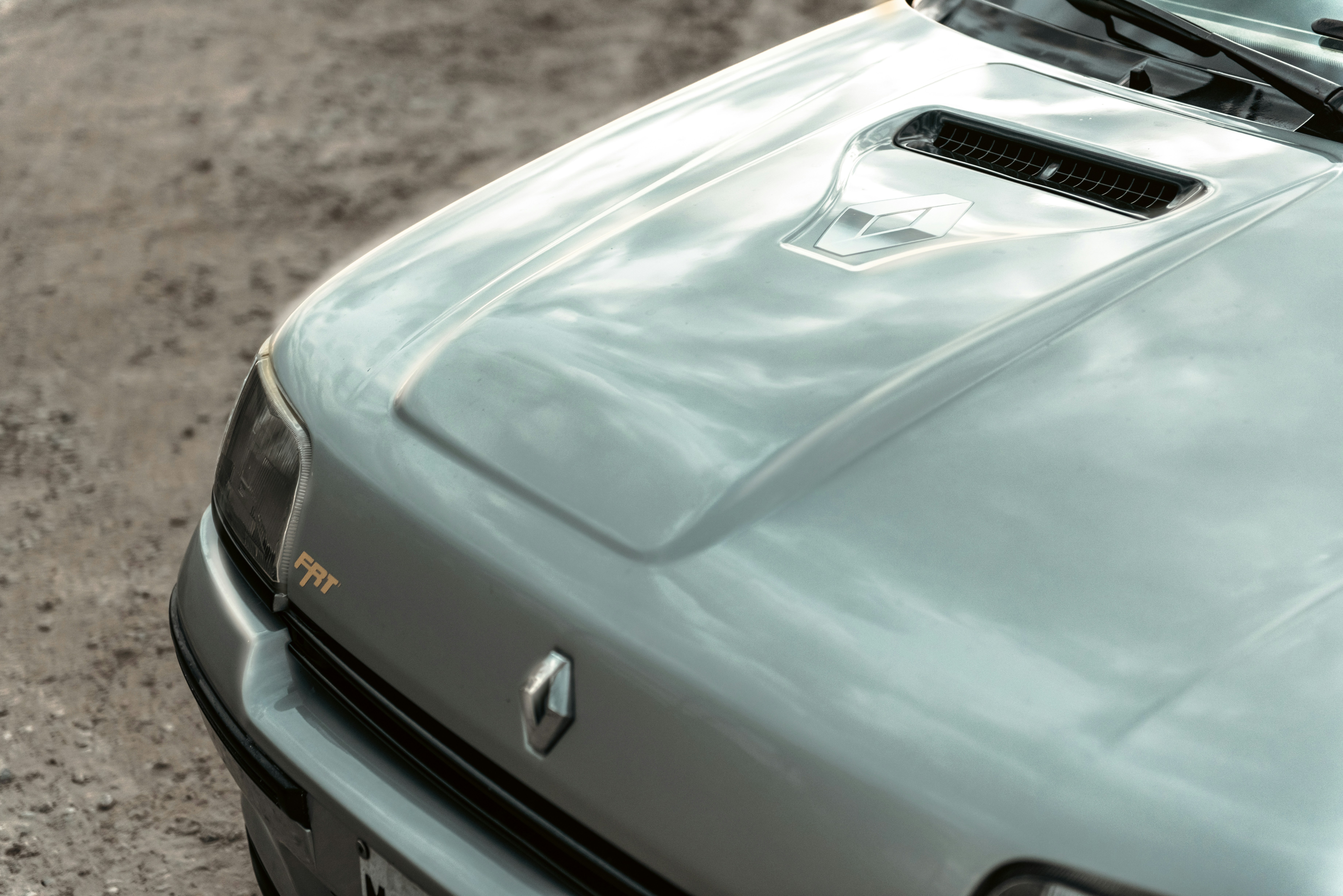 a close up of the hood of a car