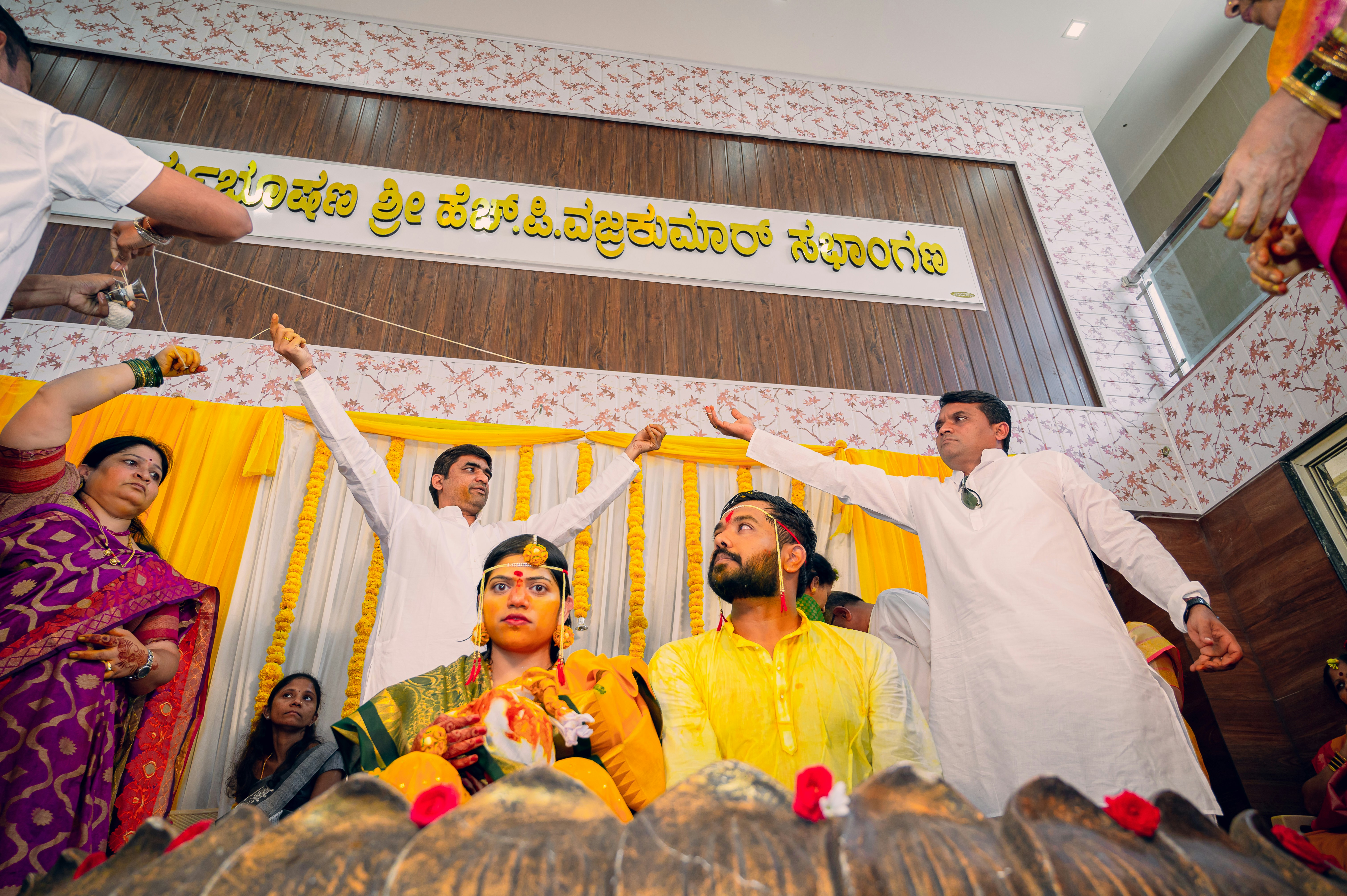 a group of people standing around each other