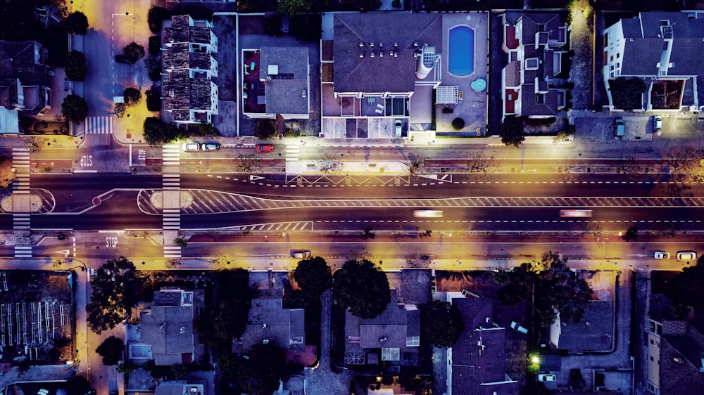 an aerial view of a city street at night