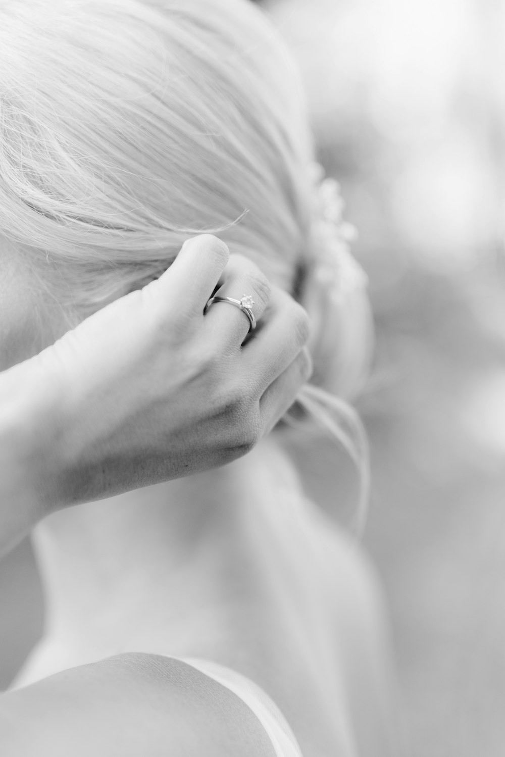 a woman with a ring on her finger