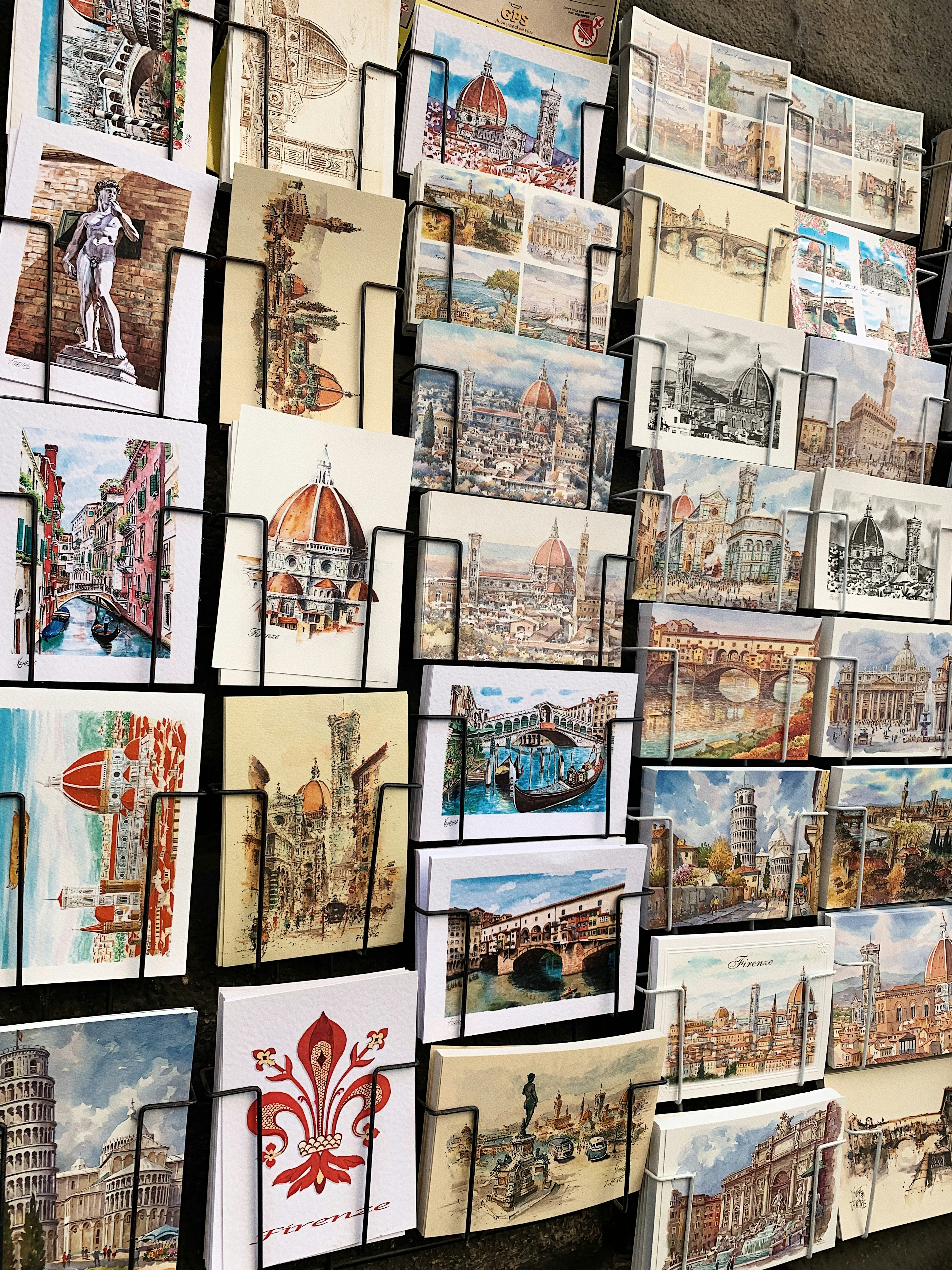 a bunch of pictures are hanging on a wall