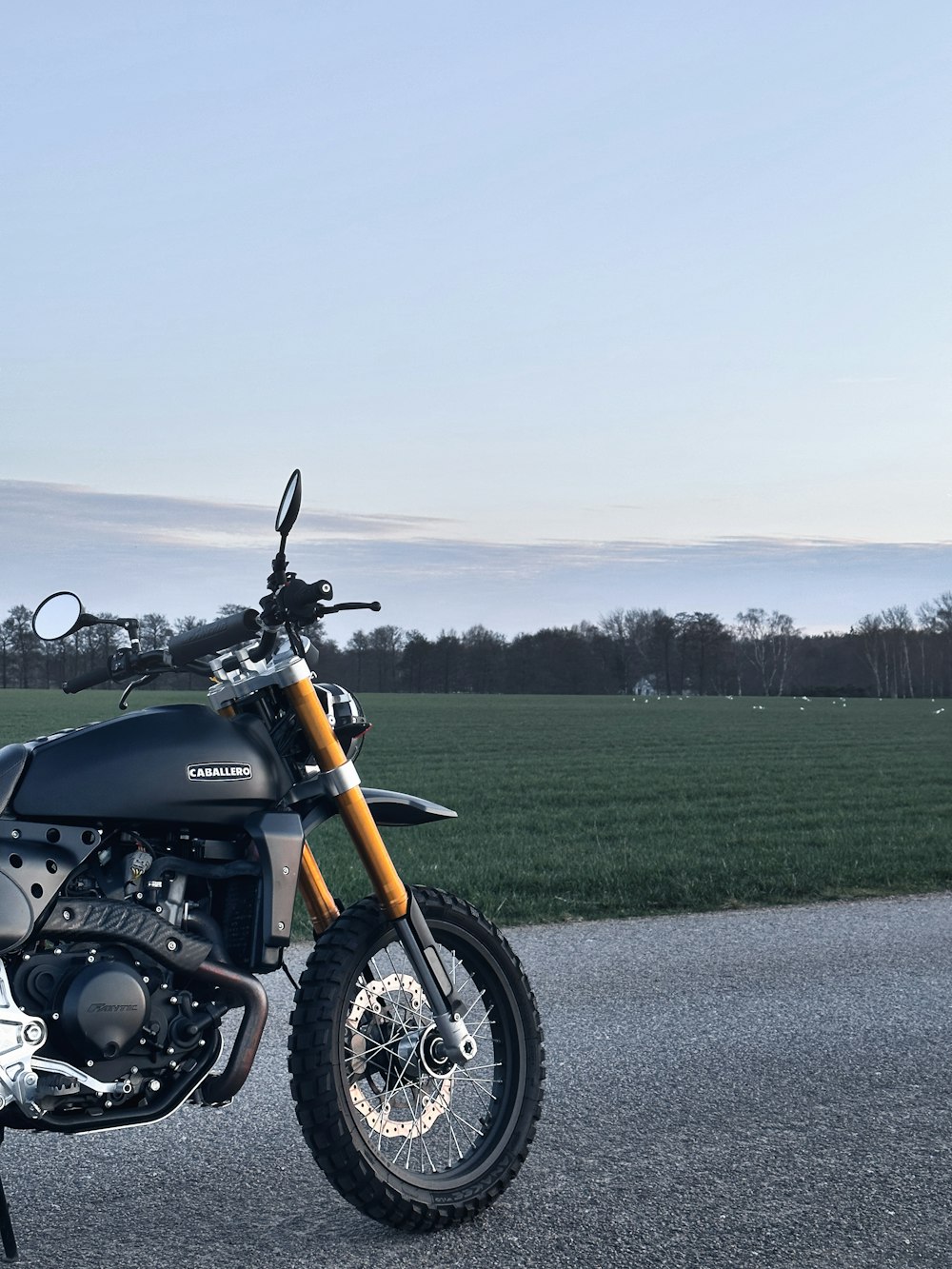 a motorcycle parked on the side of the road