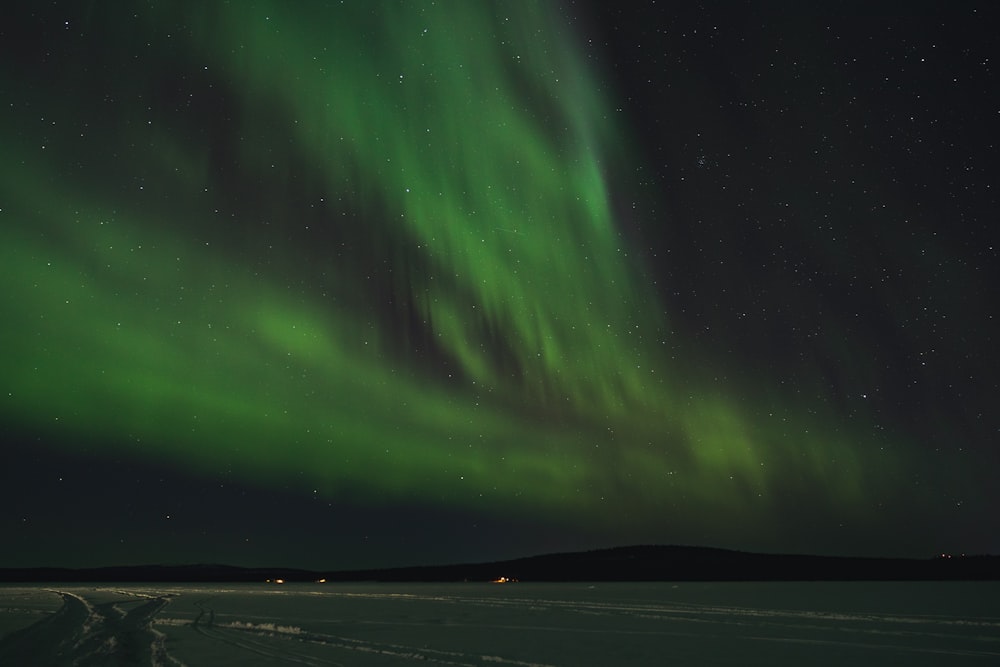 a green aurora bore in the night sky