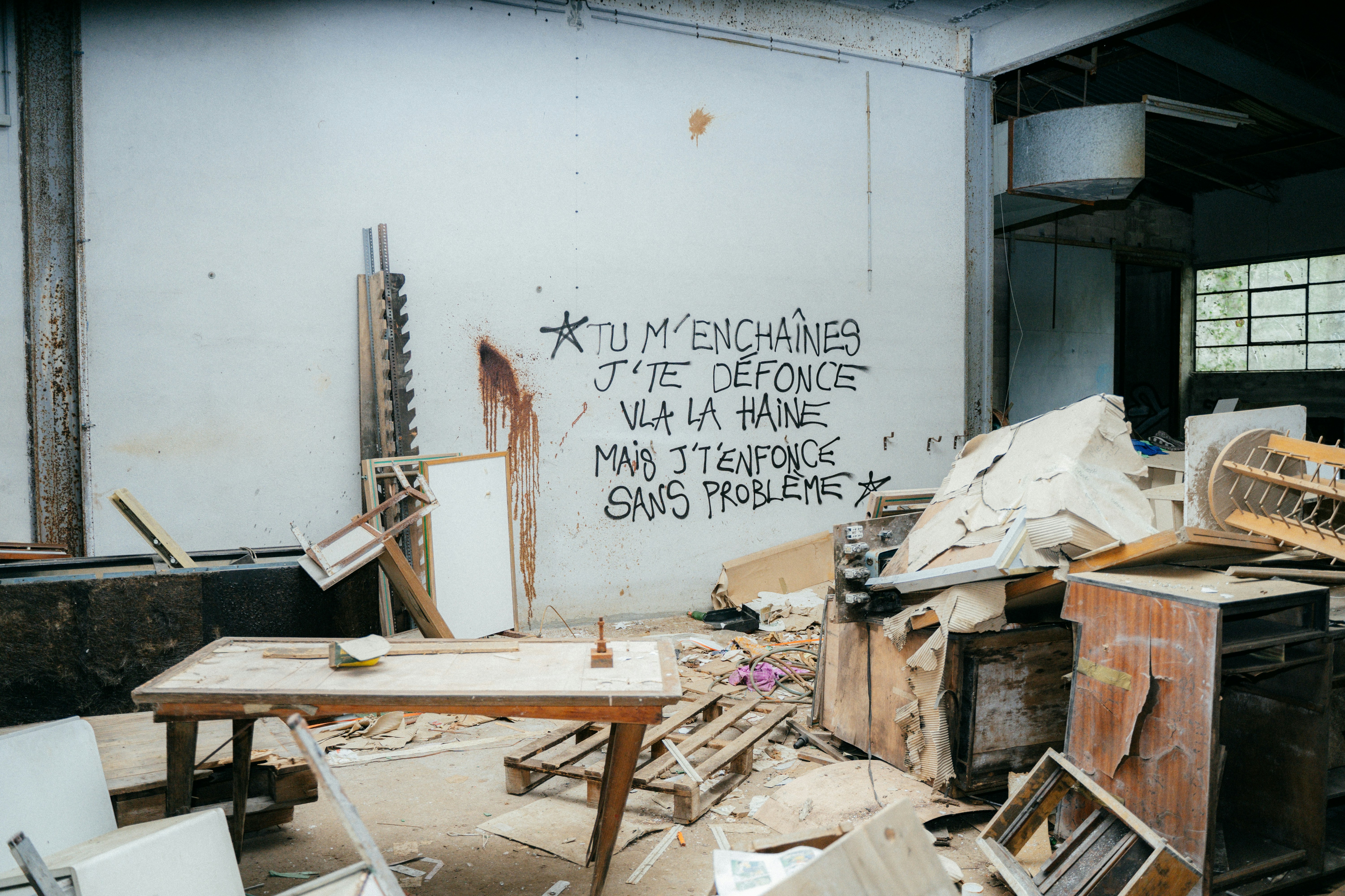 A room with a bunch of junk on the floor photo – Free Trash Image on ...