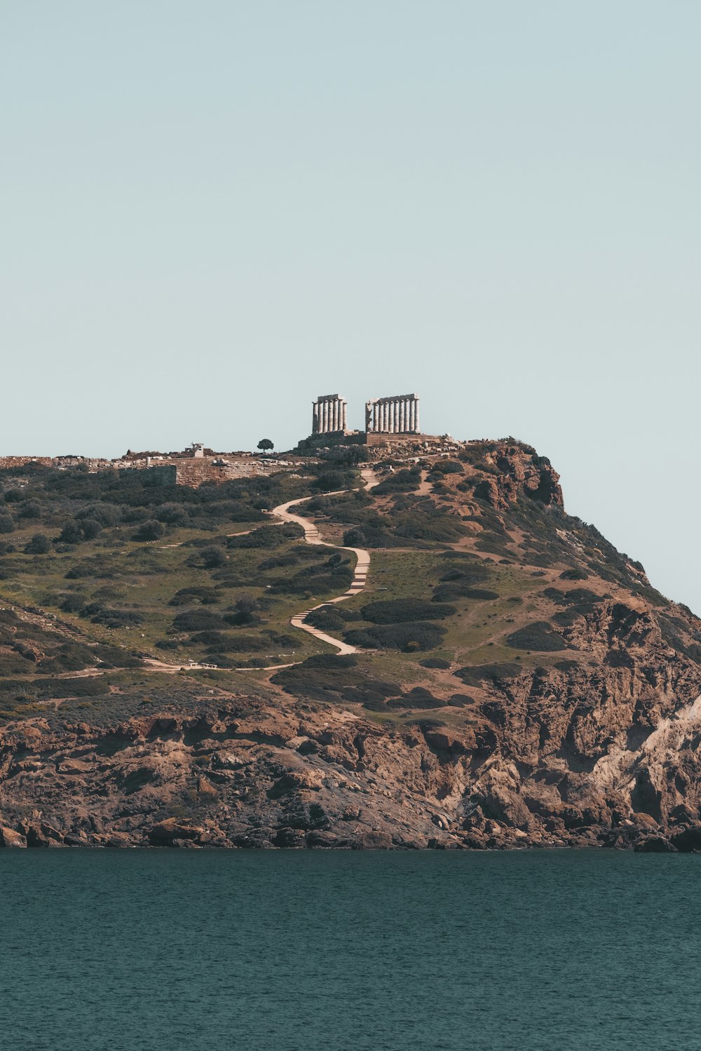 a hill that has a bench on top of it