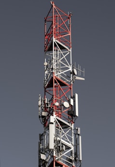a tall tower with a lot of lights on top of it