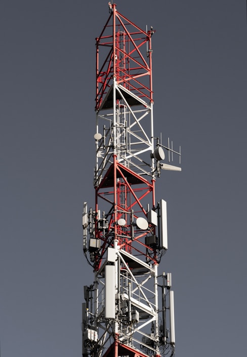a tall tower with a lot of lights on top of it