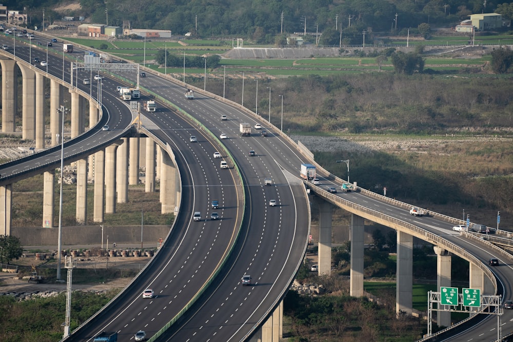 a highway with a bunch of traffic going over it