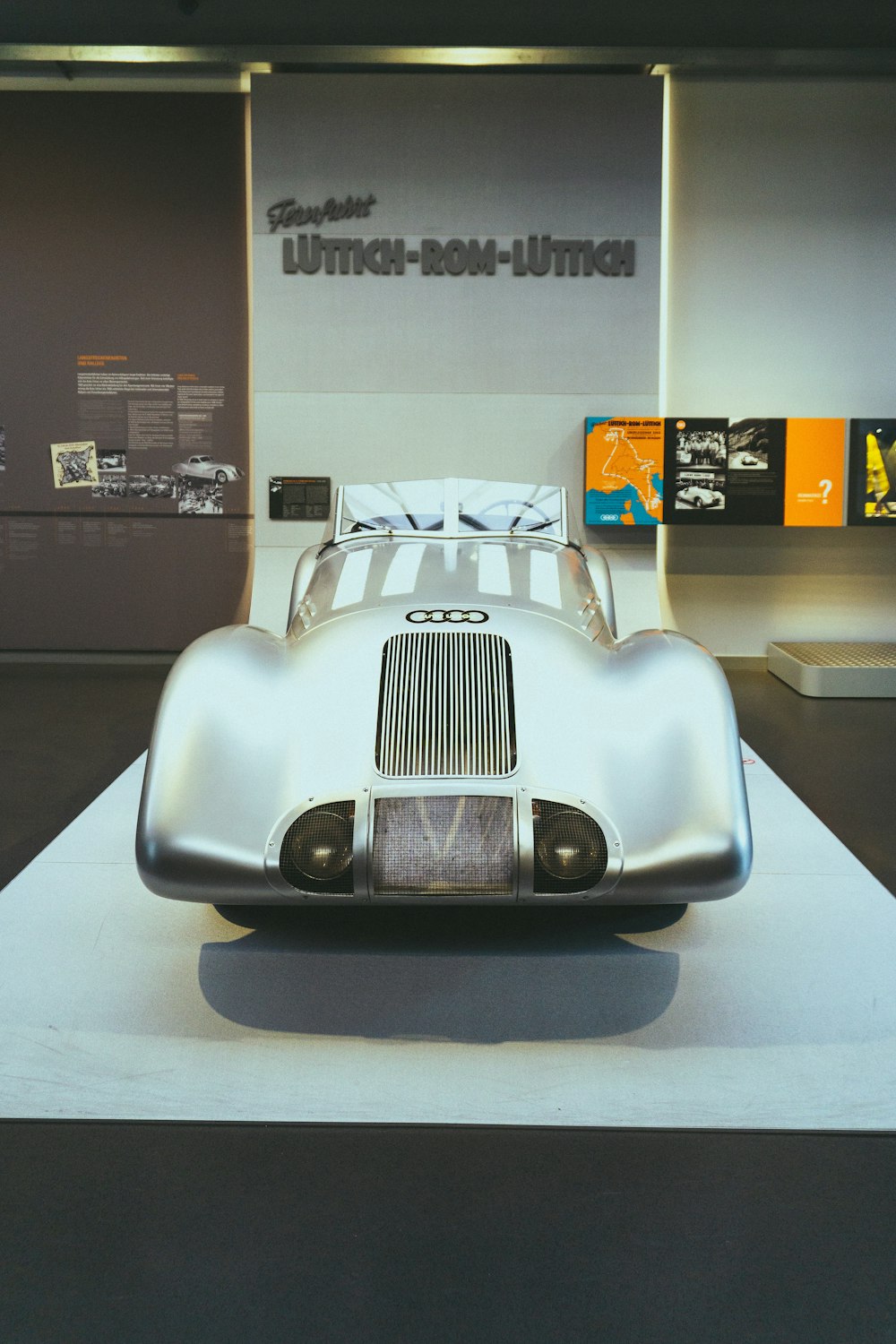 a car is on display in a museum