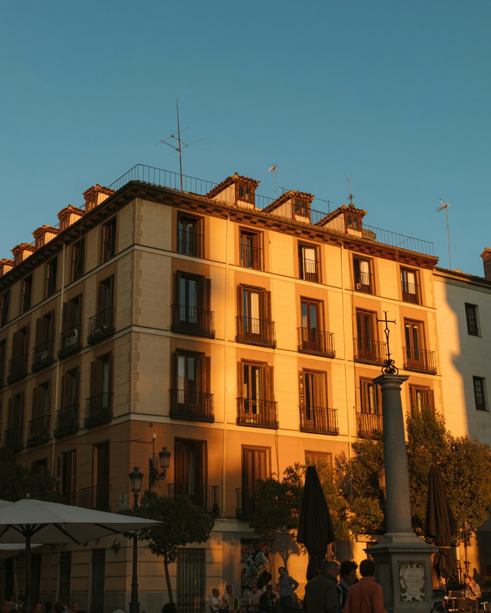 a tall building with balconies and balconies on the top of it