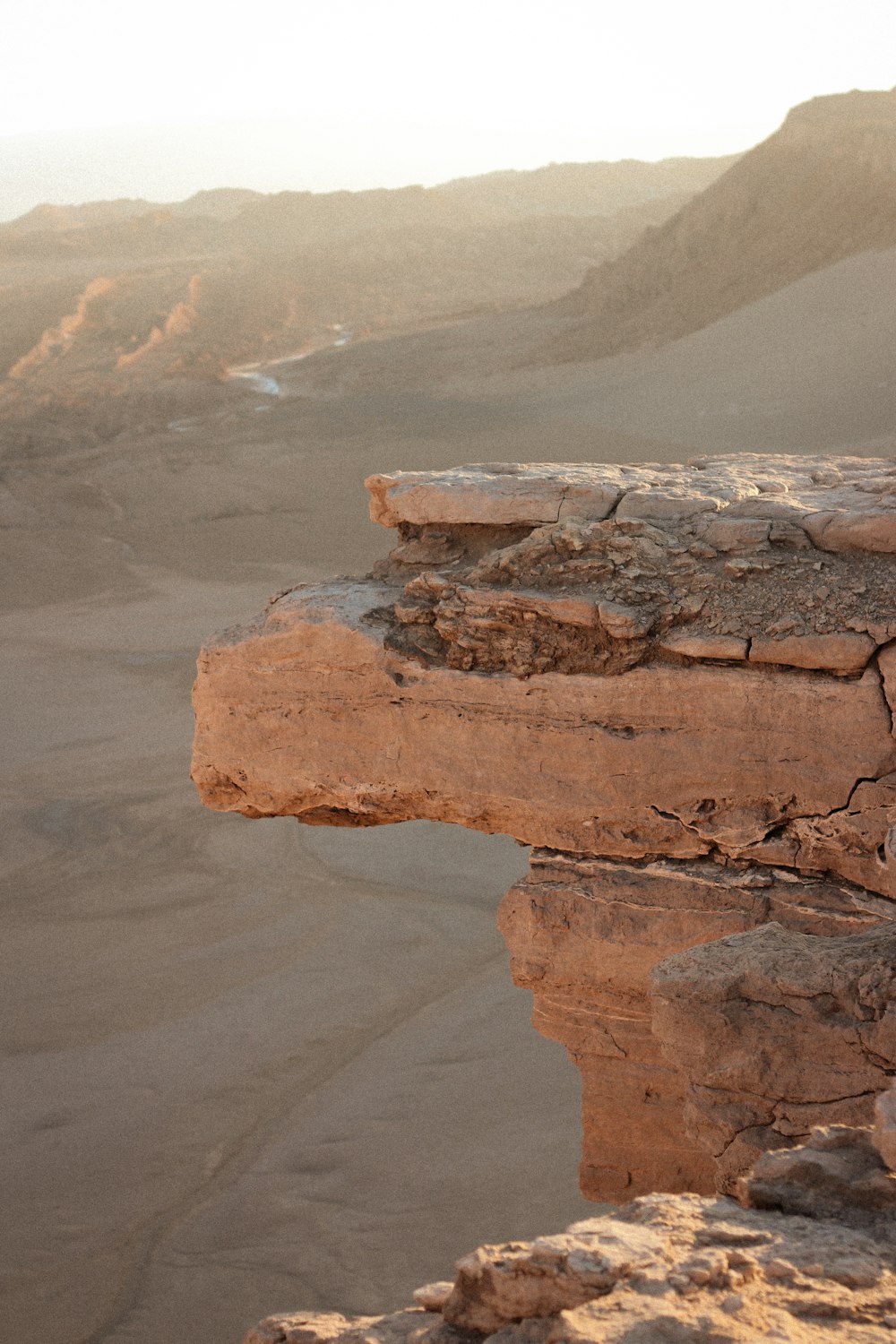 a rock formation in the middle of a desert