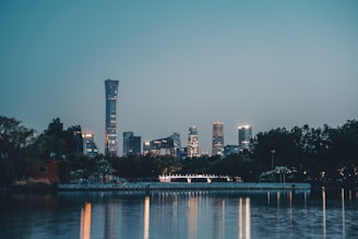 A peaceful cityscape at dawn symbolizing quiet effectiveness and technological integration in regulated industries.