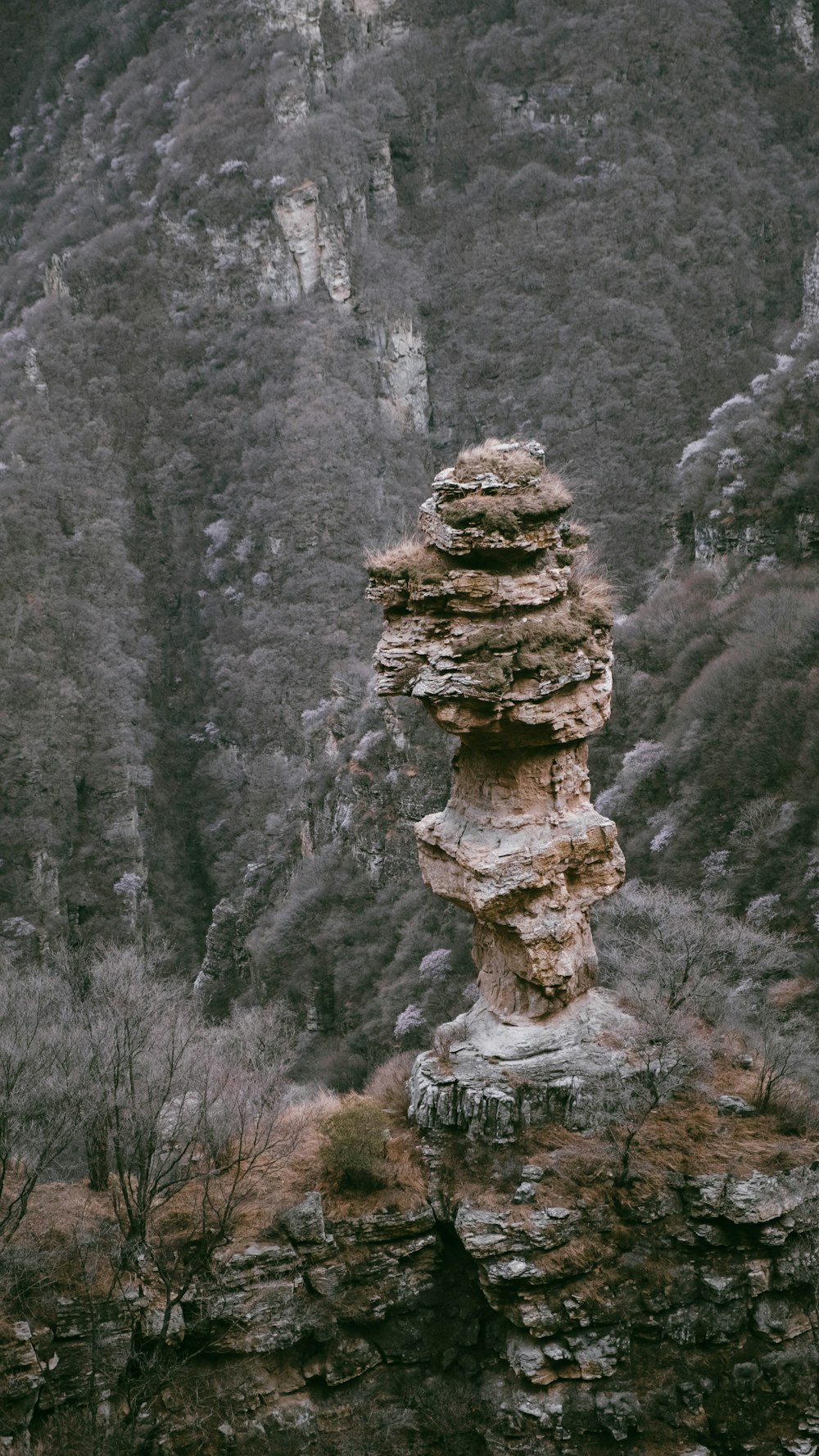 a rock formation in the middle of a mountain