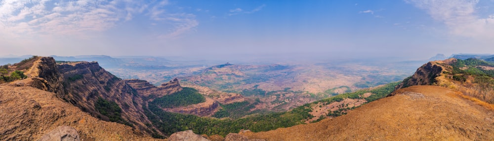 a view of the mountains from the top of a mountain