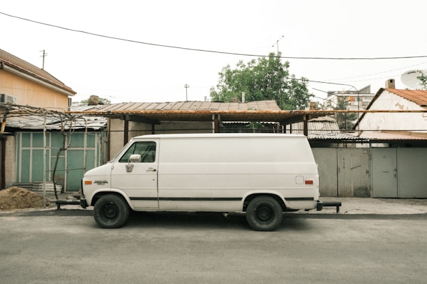 A clean, white Luton van from All Star Removals parked on a London street, ready for loading.