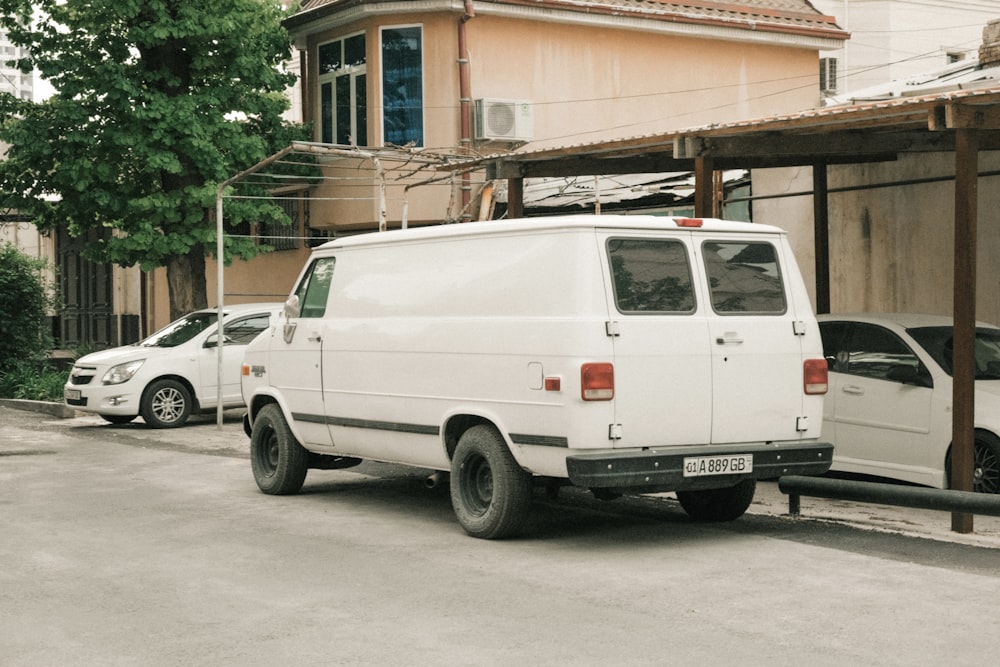 a white van parked on the side of a road