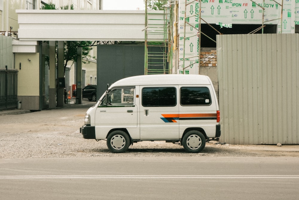 a white van parked on the side of a road