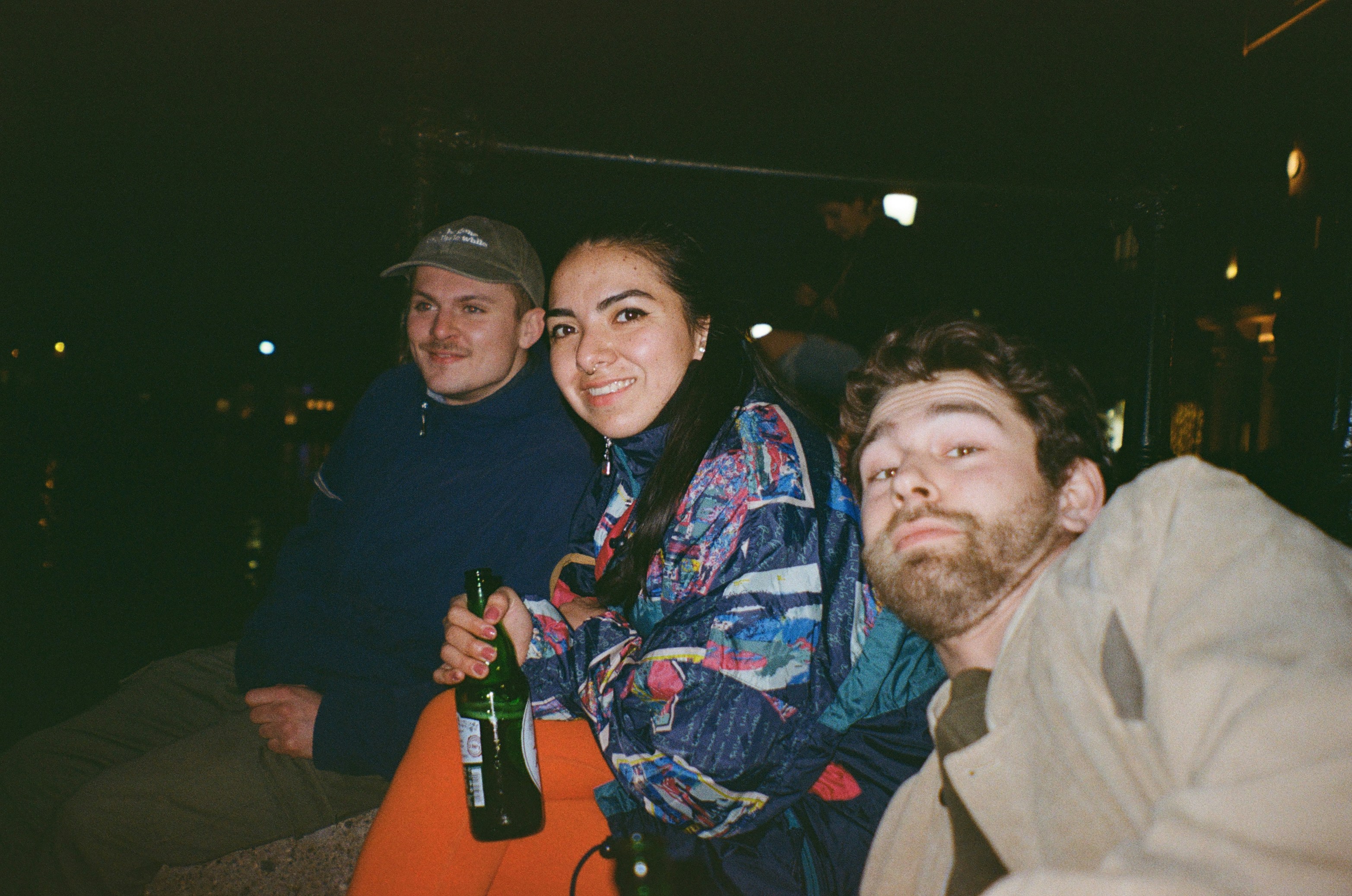 a group of people sitting next to each other