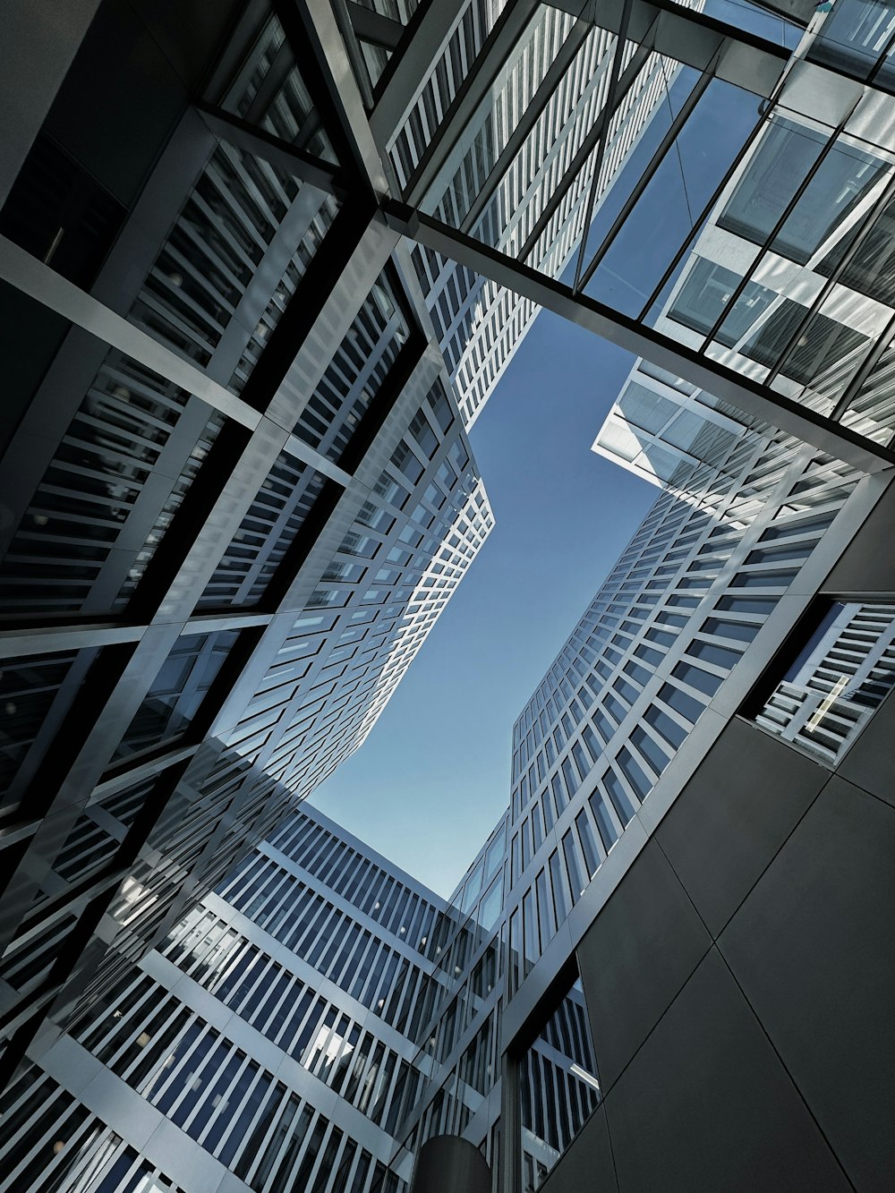 a group of tall buildings that are next to each other