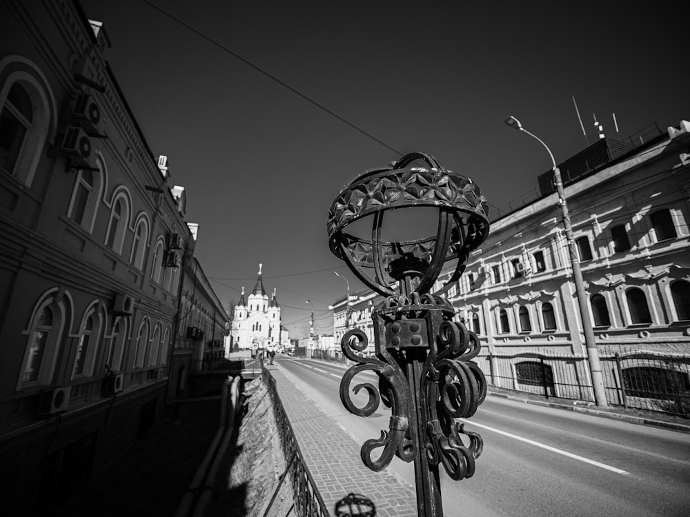 a black and white photo of a street light