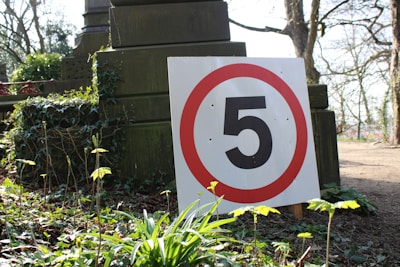 Close-up of a modern plot boundary marker with 5star property adda branding.