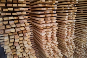 a stack of wooden planks stacked on top of each other