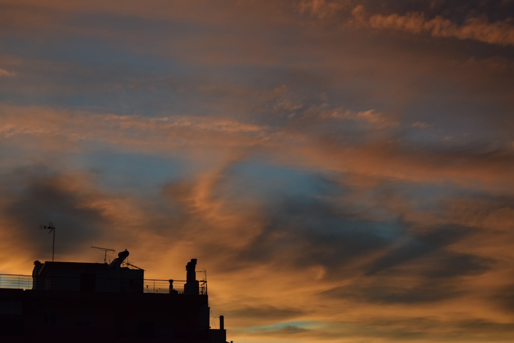 a building with a sky in the background