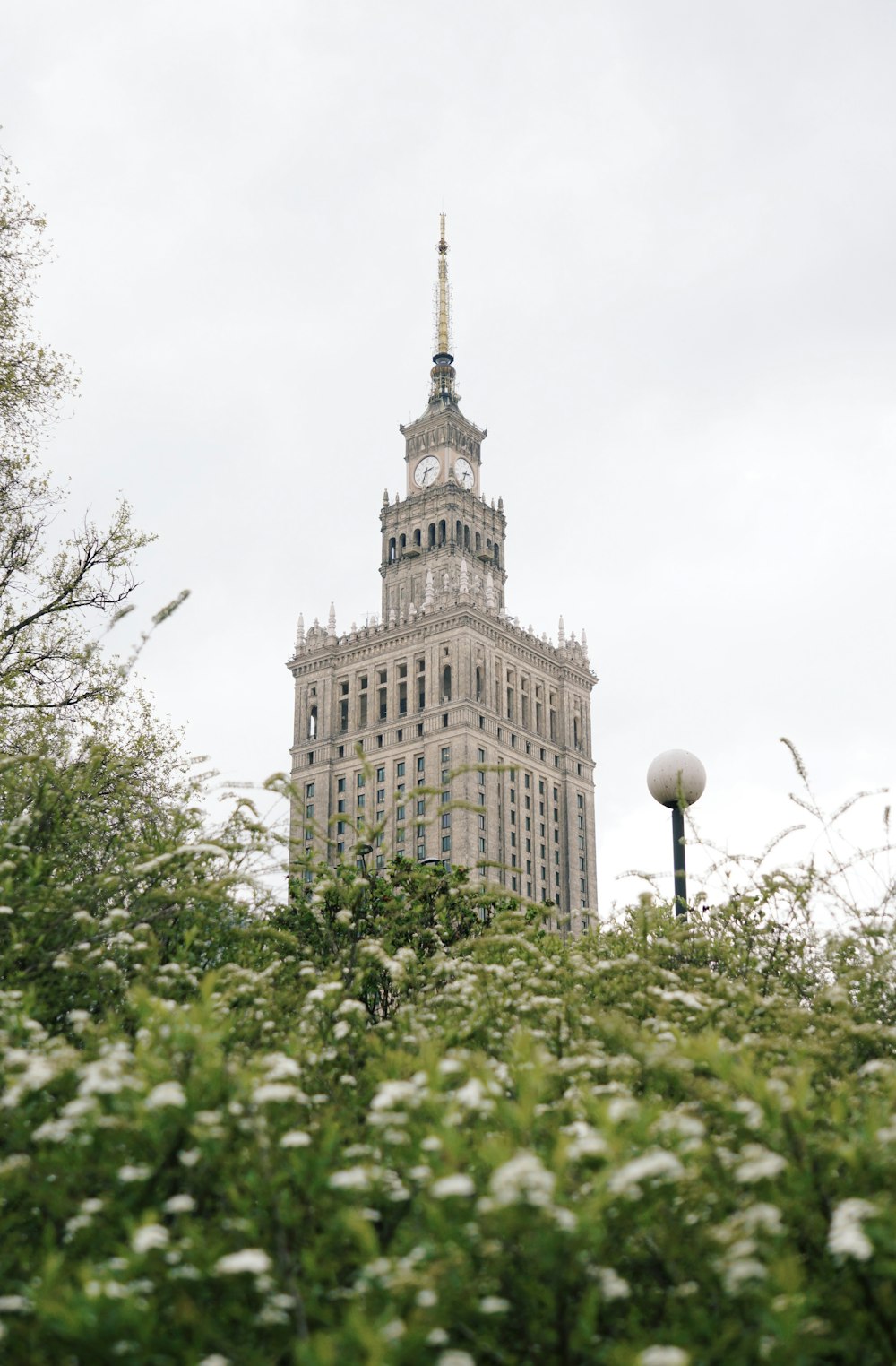 a tall building with a clock on the top of it