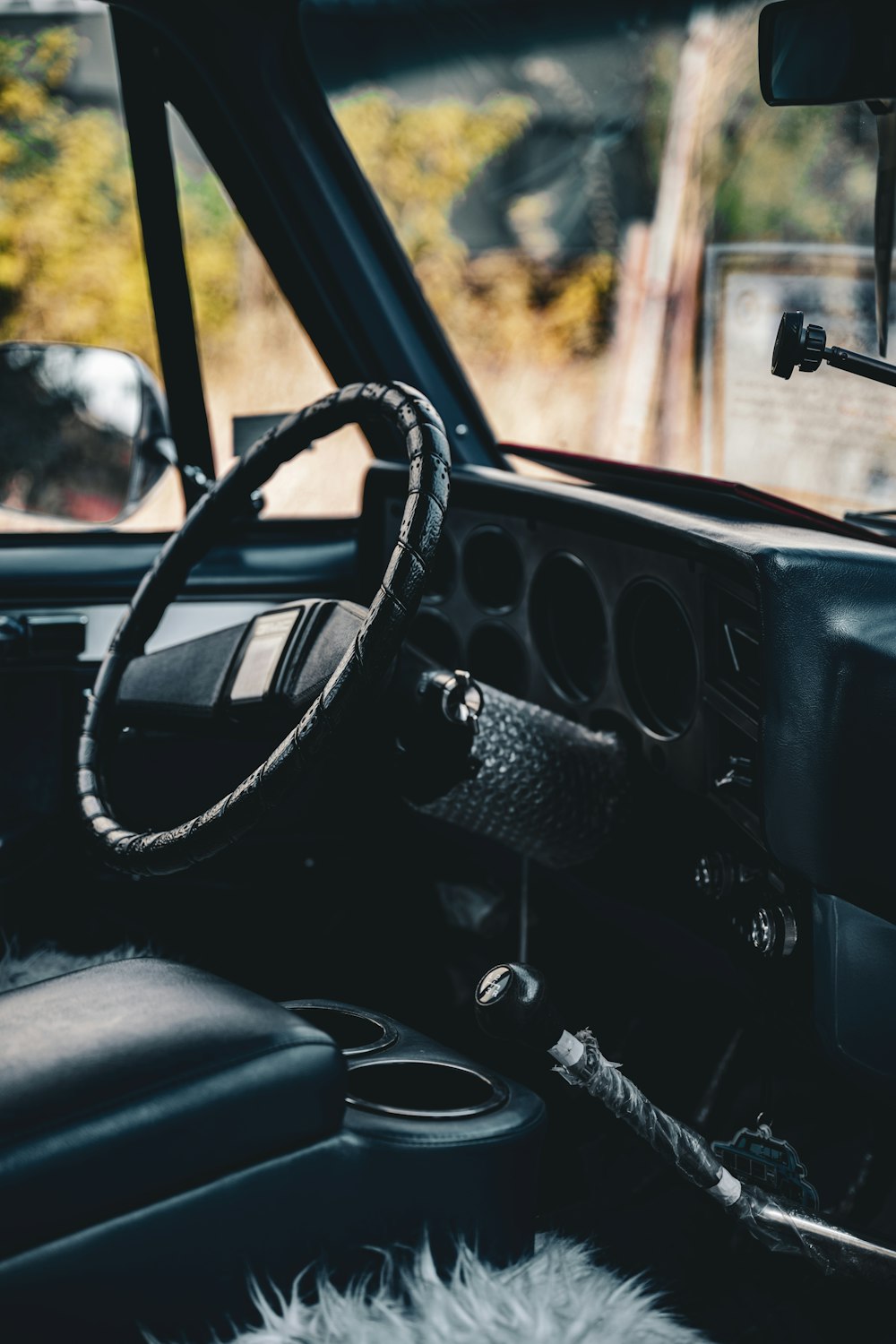 the interior of a car with a steering wheel