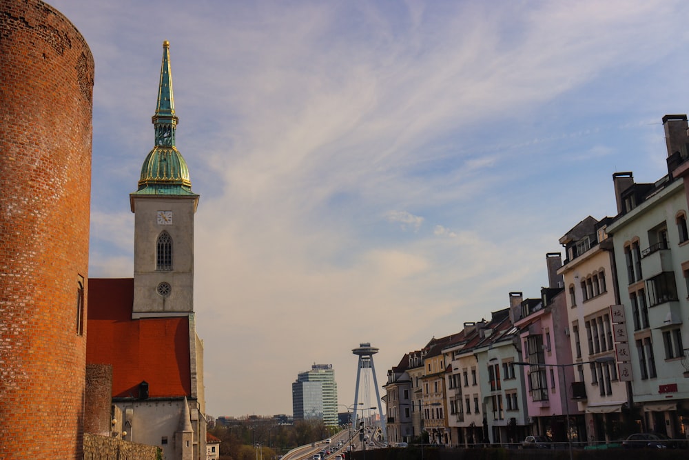 a tall clock tower towering over a city