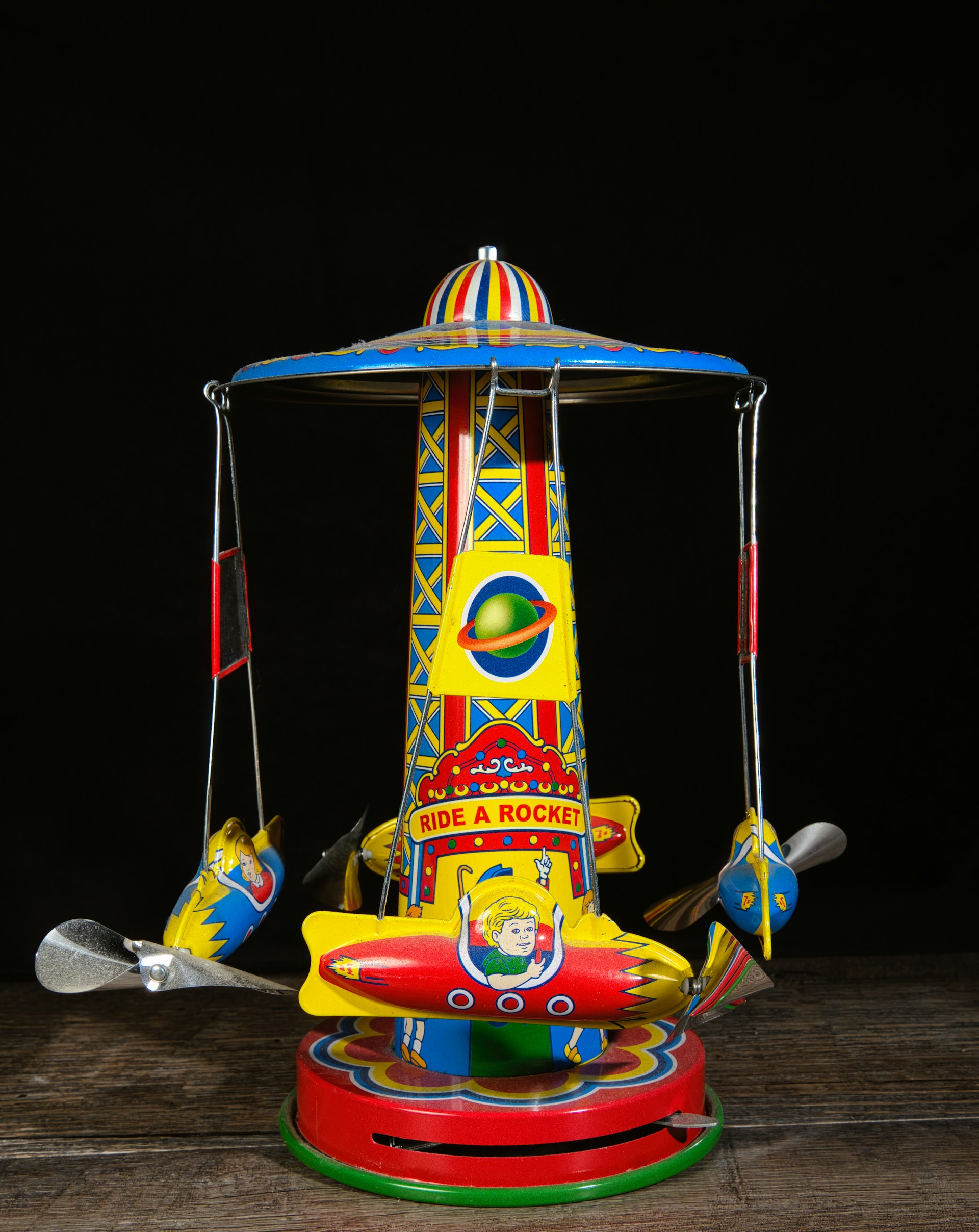 a brightly colored carnival ride on a wooden table