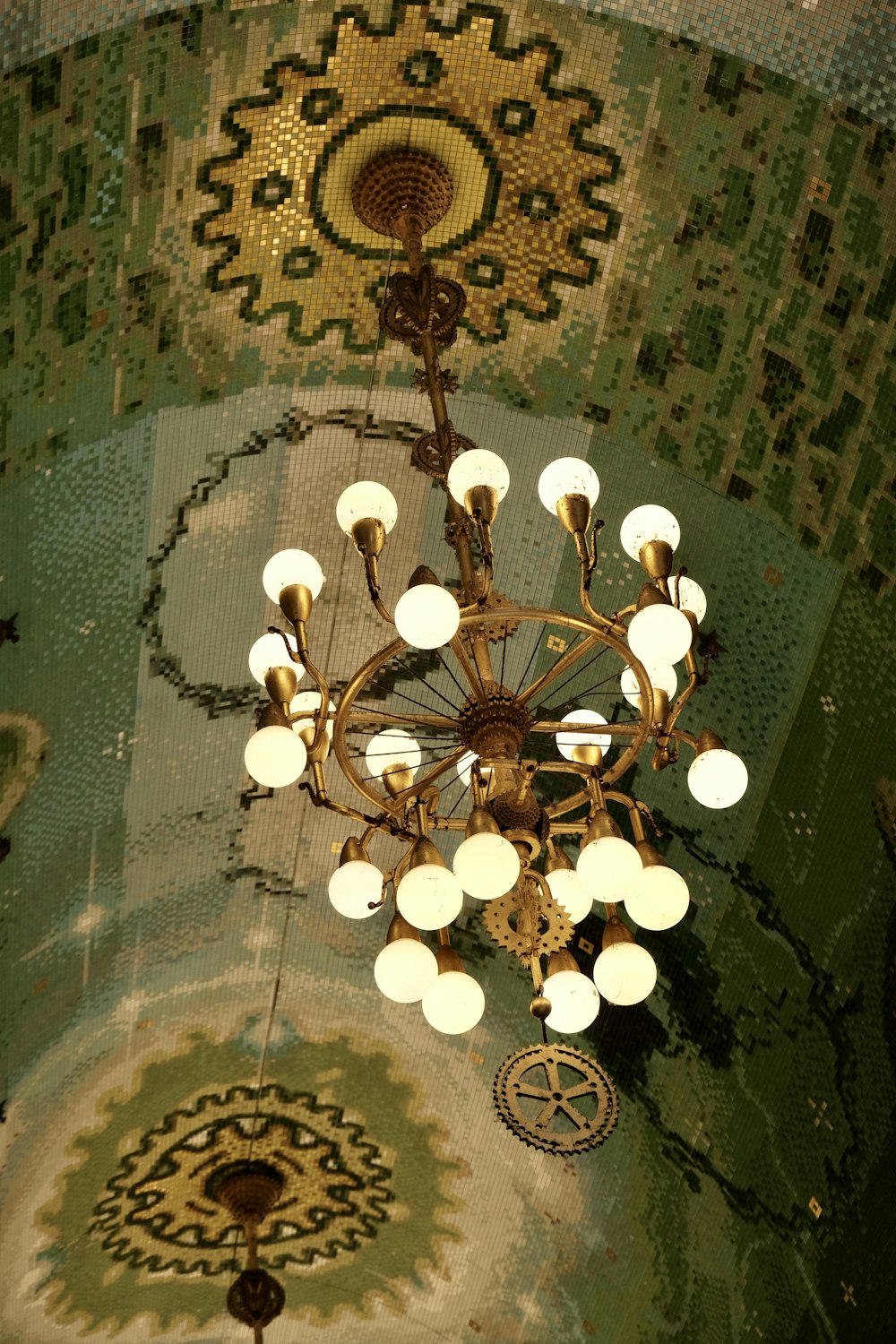 a chandelier hanging from the ceiling of a building