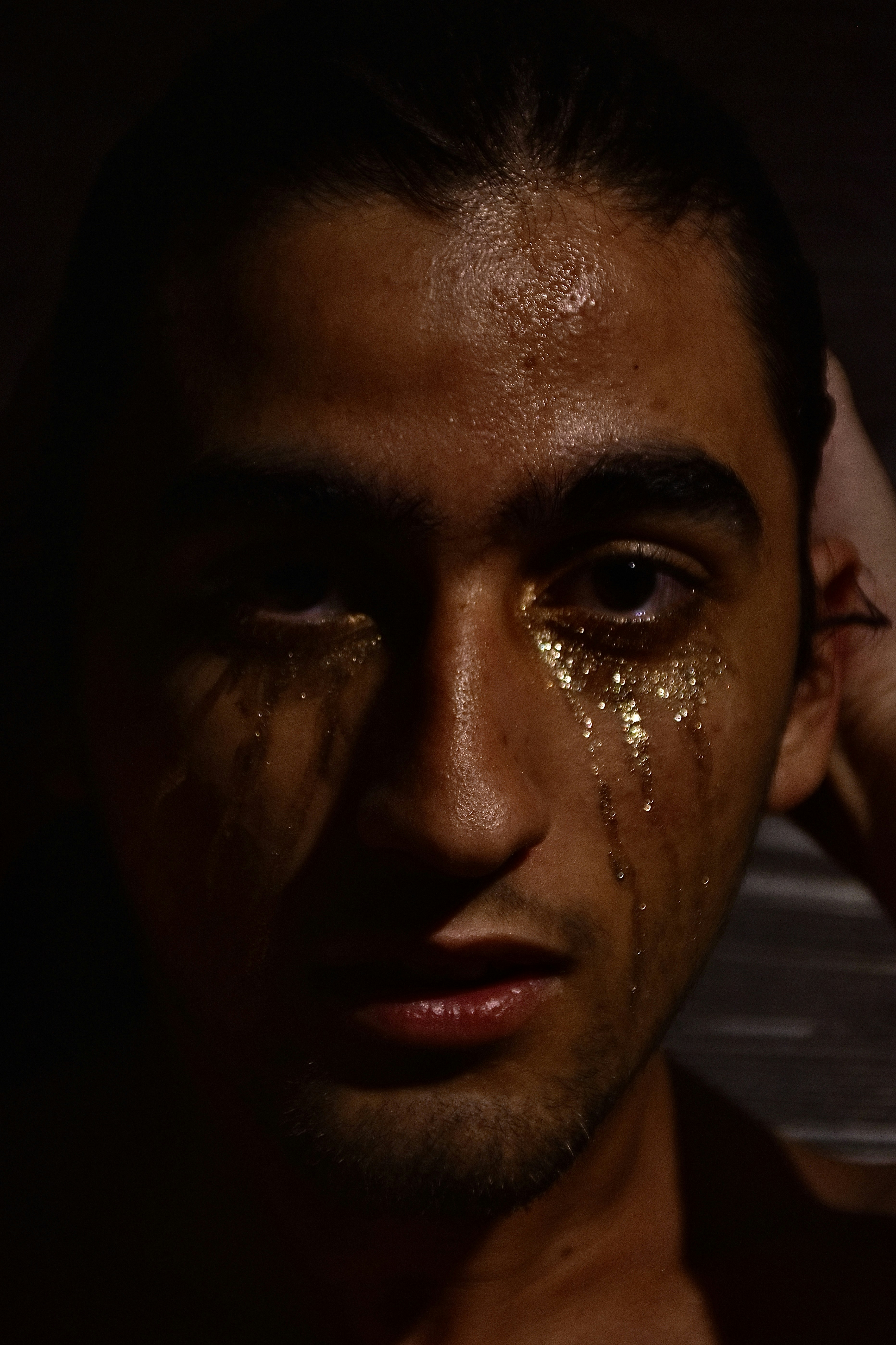 Design that evokes emotion: A person expressing strong emotions through tears